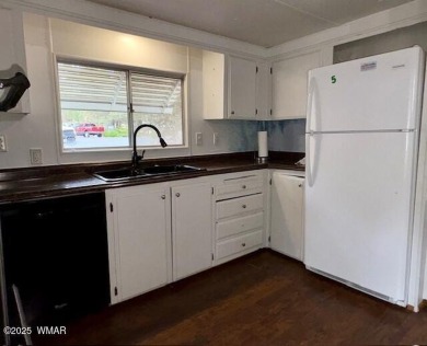 Check out this 2 bedroom, 1 bath home nestled in the tall pines on Bison Golf and Country Club in Arizona - for sale on GolfHomes.com, golf home, golf lot