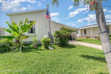 Welcome to your slice of paradise in Barefoot Bay! This charming on Barefoot Bay Golf Course in Florida - for sale on GolfHomes.com, golf home, golf lot