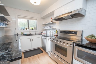 LAKEFRONT LIVING IN THE HEART OF PEACHTREE CITY! Welcome to this on Canongate At Flat Creek Club in Georgia - for sale on GolfHomes.com, golf home, golf lot