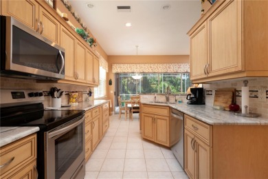 Exceptional value and privacy await! This extended Antiqua model on Seminole Lakes Country Club in Florida - for sale on GolfHomes.com, golf home, golf lot