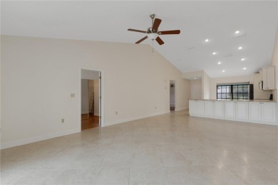 Expansive Golf Course views captures your attention as soon as on University Park Country Club in Florida - for sale on GolfHomes.com, golf home, golf lot