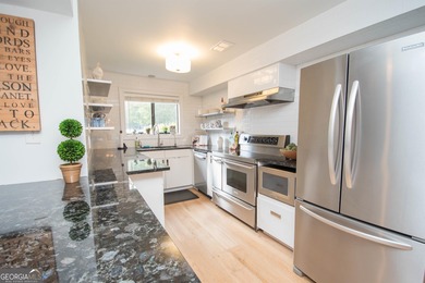 LAKEFRONT LIVING IN THE HEART OF PEACHTREE CITY! Welcome to this on Canongate At Flat Creek Club in Georgia - for sale on GolfHomes.com, golf home, golf lot