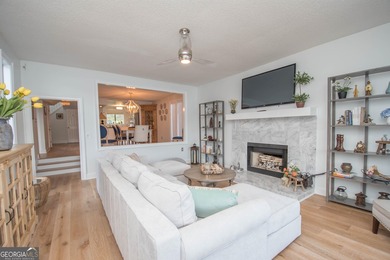 LAKEFRONT LIVING IN THE HEART OF PEACHTREE CITY! Welcome to this on Canongate At Flat Creek Club in Georgia - for sale on GolfHomes.com, golf home, golf lot