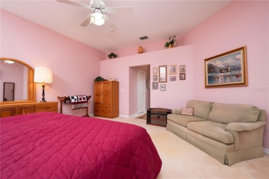 Exceptional value and privacy await! This extended Antiqua model on Seminole Lakes Country Club in Florida - for sale on GolfHomes.com, golf home, golf lot