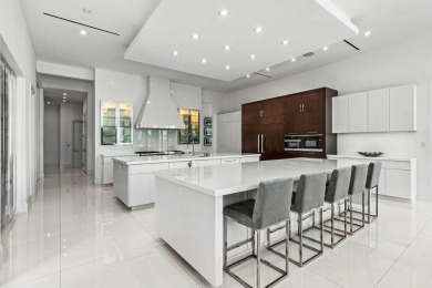 Style, space, and function come together to create perfection in on St. Andrews Country Club of Boca Raton in Florida - for sale on GolfHomes.com, golf home, golf lot