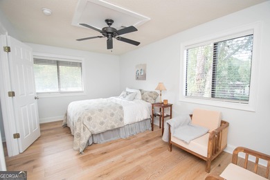 LAKEFRONT LIVING IN THE HEART OF PEACHTREE CITY! Fully furnished on Canongate At Flat Creek Club in Georgia - for sale on GolfHomes.com, golf home, golf lot