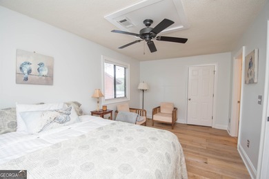 LAKEFRONT LIVING IN THE HEART OF PEACHTREE CITY! Fully furnished on Canongate At Flat Creek Club in Georgia - for sale on GolfHomes.com, golf home, golf lot