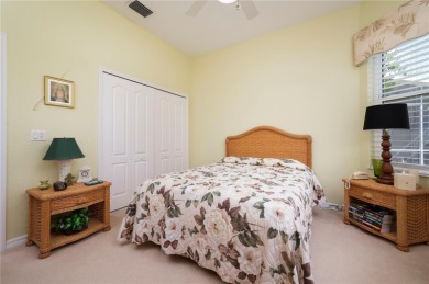 Exceptional value and privacy await! This extended Antiqua model on Seminole Lakes Country Club in Florida - for sale on GolfHomes.com, golf home, golf lot