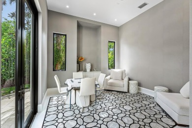 Style, space, and function come together to create perfection in on St. Andrews Country Club of Boca Raton in Florida - for sale on GolfHomes.com, golf home, golf lot