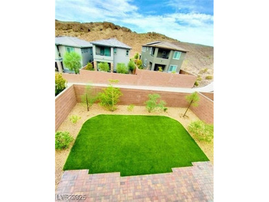 Located in a gated community within the Lake Las Vegas Golf on Falls Golf Course in Nevada - for sale on GolfHomes.com, golf home, golf lot