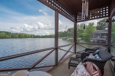 LAKEFRONT LIVING IN THE HEART OF PEACHTREE CITY! Fully furnished on Canongate At Flat Creek Club in Georgia - for sale on GolfHomes.com, golf home, golf lot