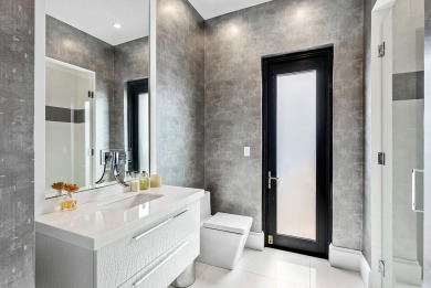 Style, space, and function come together to create perfection in on St. Andrews Country Club of Boca Raton in Florida - for sale on GolfHomes.com, golf home, golf lot
