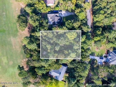 This .63 acre golf front lot gives you the space to build the on Olde Point Golf and Country Club in North Carolina - for sale on GolfHomes.com, golf home, golf lot