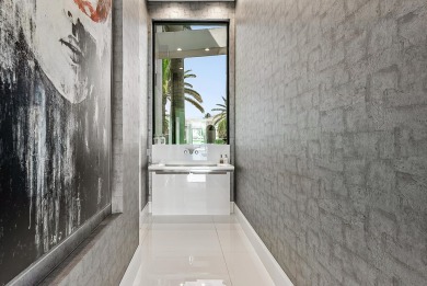 Style, space, and function come together to create perfection in on St. Andrews Country Club of Boca Raton in Florida - for sale on GolfHomes.com, golf home, golf lot