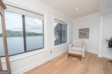 LAKEFRONT LIVING IN THE HEART OF PEACHTREE CITY! Fully furnished on Canongate At Flat Creek Club in Georgia - for sale on GolfHomes.com, golf home, golf lot