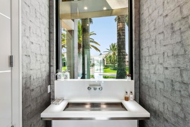 Style, space, and function come together to create perfection in on St. Andrews Country Club of Boca Raton in Florida - for sale on GolfHomes.com, golf home, golf lot