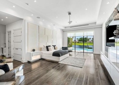 Style, space, and function come together to create perfection in on St. Andrews Country Club of Boca Raton in Florida - for sale on GolfHomes.com, golf home, golf lot