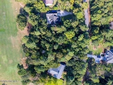 This .63 acre golf front lot gives you the space to build the on Olde Point Golf and Country Club in North Carolina - for sale on GolfHomes.com, golf home, golf lot