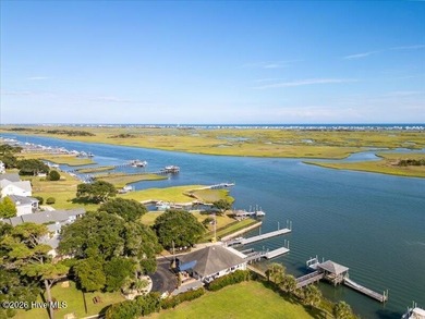 This .63 acre golf front lot gives you the space to build the on Olde Point Golf and Country Club in North Carolina - for sale on GolfHomes.com, golf home, golf lot