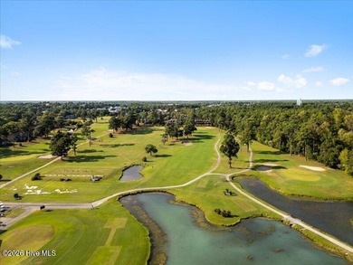 This .63 acre golf front lot gives you the space to build the on Olde Point Golf and Country Club in North Carolina - for sale on GolfHomes.com, golf home, golf lot