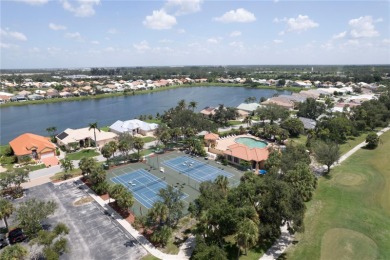 Exceptional value and privacy await! This extended Antiqua model on Seminole Lakes Country Club in Florida - for sale on GolfHomes.com, golf home, golf lot