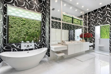Style, space, and function come together to create perfection in on St. Andrews Country Club of Boca Raton in Florida - for sale on GolfHomes.com, golf home, golf lot