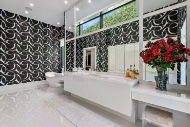 Style, space, and function come together to create perfection in on St. Andrews Country Club of Boca Raton in Florida - for sale on GolfHomes.com, golf home, golf lot