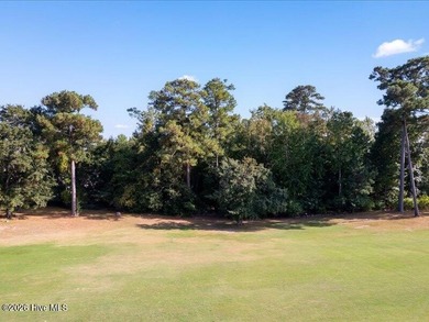 This .63 acre golf front lot gives you the space to build the on Olde Point Golf and Country Club in North Carolina - for sale on GolfHomes.com, golf home, golf lot