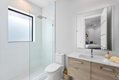 Style, space, and function come together to create perfection in on St. Andrews Country Club of Boca Raton in Florida - for sale on GolfHomes.com, golf home, golf lot