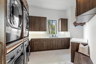 Style, space, and function come together to create perfection in on St. Andrews Country Club of Boca Raton in Florida - for sale on GolfHomes.com, golf home, golf lot