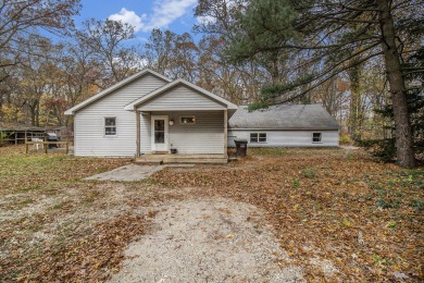 Discover the perfect blend of country living and convenience at on Eagle Island Golf Club in Michigan - for sale on GolfHomes.com, golf home, golf lot