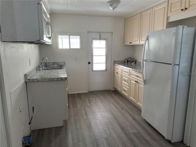 Step into luxury and relaxation in this beautifully updated on High Point Golf Club, Inc. in Florida - for sale on GolfHomes.com, golf home, golf lot