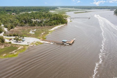 Build your dream home in a gated waterfront community in the on Glen Dornoch Waterway Golf Links in South Carolina - for sale on GolfHomes.com, golf home, golf lot