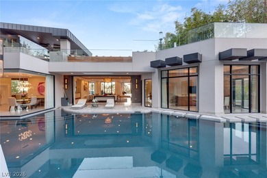 Within triple gated Promontory Pointe, and behind its own on Red Rock Country Club in Nevada - for sale on GolfHomes.com, golf home, golf lot