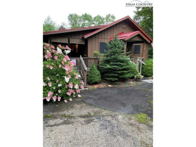 Welcome to this beautifully updated year-round home in Linville on Land Harbor Golf Course in North Carolina - for sale on GolfHomes.com, golf home, golf lot