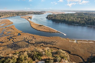 Build your dream home in a gated waterfront community in the on Glen Dornoch Waterway Golf Links in South Carolina - for sale on GolfHomes.com, golf home, golf lot