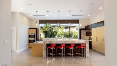 Within triple gated Promontory Pointe, and behind its own on Red Rock Country Club in Nevada - for sale on GolfHomes.com, golf home, golf lot