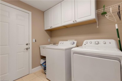 Experience resort-style living in this stunning two-bedroom + on Spanish Wells Golf and Country Club in Florida - for sale on GolfHomes.com, golf home, golf lot