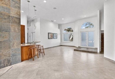 Totally updated kitchen and bathrooms in this four bedroom, 3 on  in Florida - for sale on GolfHomes.com, golf home, golf lot