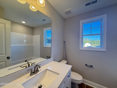 Premium lot! Don't miss this stunning new home in downtown on Riverwood Golf and Athletic Club in North Carolina - for sale on GolfHomes.com, golf home, golf lot