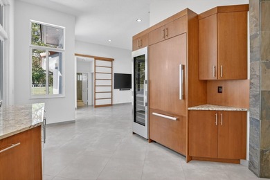 Totally updated kitchen and bathrooms in this four bedroom, 3 on  in Florida - for sale on GolfHomes.com, golf home, golf lot