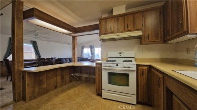 A well-kept spacious home nestled in a beautiful 55+ community on Sun Lakes Country Club in California - for sale on GolfHomes.com, golf home, golf lot