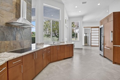 Totally updated kitchen and bathrooms in this four bedroom, 3 on  in Florida - for sale on GolfHomes.com, golf home, golf lot