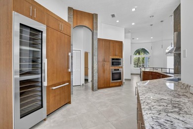 Totally updated kitchen and bathrooms in this four bedroom, 3 on  in Florida - for sale on GolfHomes.com, golf home, golf lot