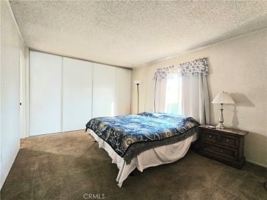 A well-kept spacious home nestled in a beautiful 55+ community on Sun Lakes Country Club in California - for sale on GolfHomes.com, golf home, golf lot