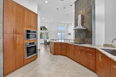 Totally updated kitchen and bathrooms in this four bedroom, 3 on  in Florida - for sale on GolfHomes.com, golf home, golf lot