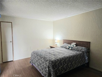 A well-kept spacious home nestled in a beautiful 55+ community on Sun Lakes Country Club in California - for sale on GolfHomes.com, golf home, golf lot