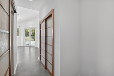 Totally updated kitchen and bathrooms in this four bedroom, 3 on  in Florida - for sale on GolfHomes.com, golf home, golf lot