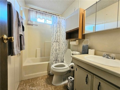 A well-kept spacious home nestled in a beautiful 55+ community on Sun Lakes Country Club in California - for sale on GolfHomes.com, golf home, golf lot