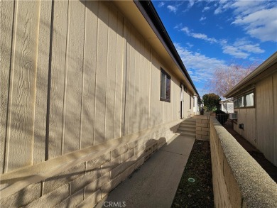 A well-kept spacious home nestled in a beautiful 55+ community on Sun Lakes Country Club in California - for sale on GolfHomes.com, golf home, golf lot
